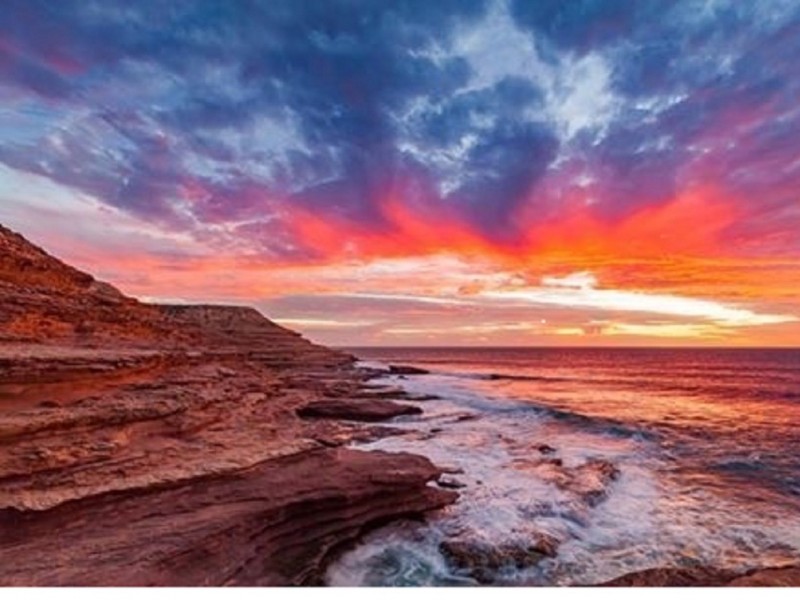 Sunset Coastal Cliff Cruise